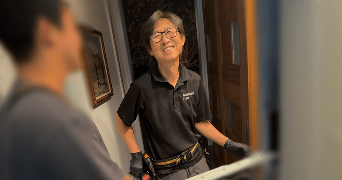 Shaun in a work uniform with a tool belt, representing a hands-on career in skilled service trades.