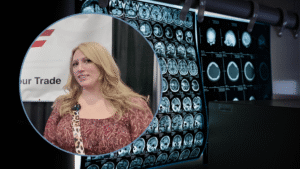 A healthcare professional in front of a TradeWorks USA display, with an inset showing multiple high-resolution MRI brain scans on a lightboard, highlighting the technical nature of medical imaging trades.