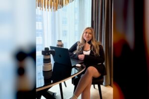 Film production career inspiration — Silvanna, a film production professional, at her desk with her camera gear and laptop