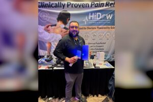 Medical device sales career inspiration — Justin, a manufacturer’s representative, at a medical device trade show booth